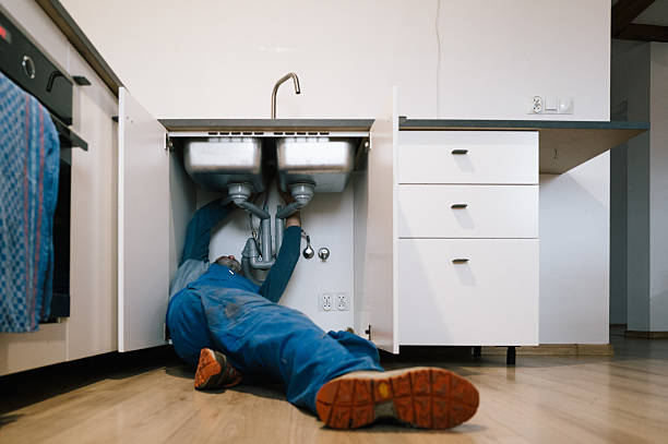 Professional Emergency Plumber technician working in Canfield, OH